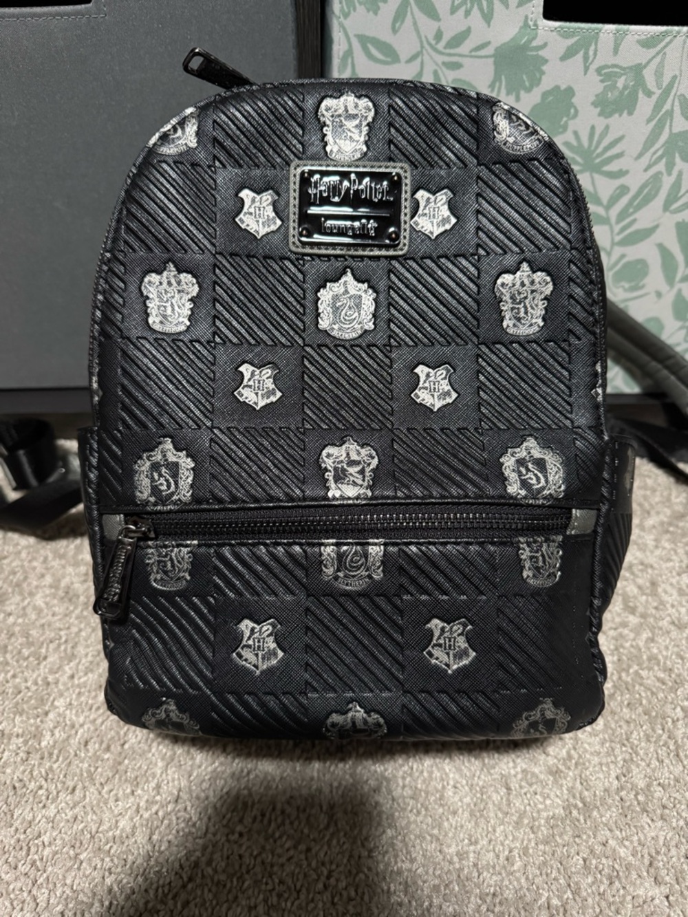 Loungefly Harry Potter Black Mini Backpack with Hogwarts Houses